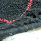 Vintage ancestral black Berber rug in wool