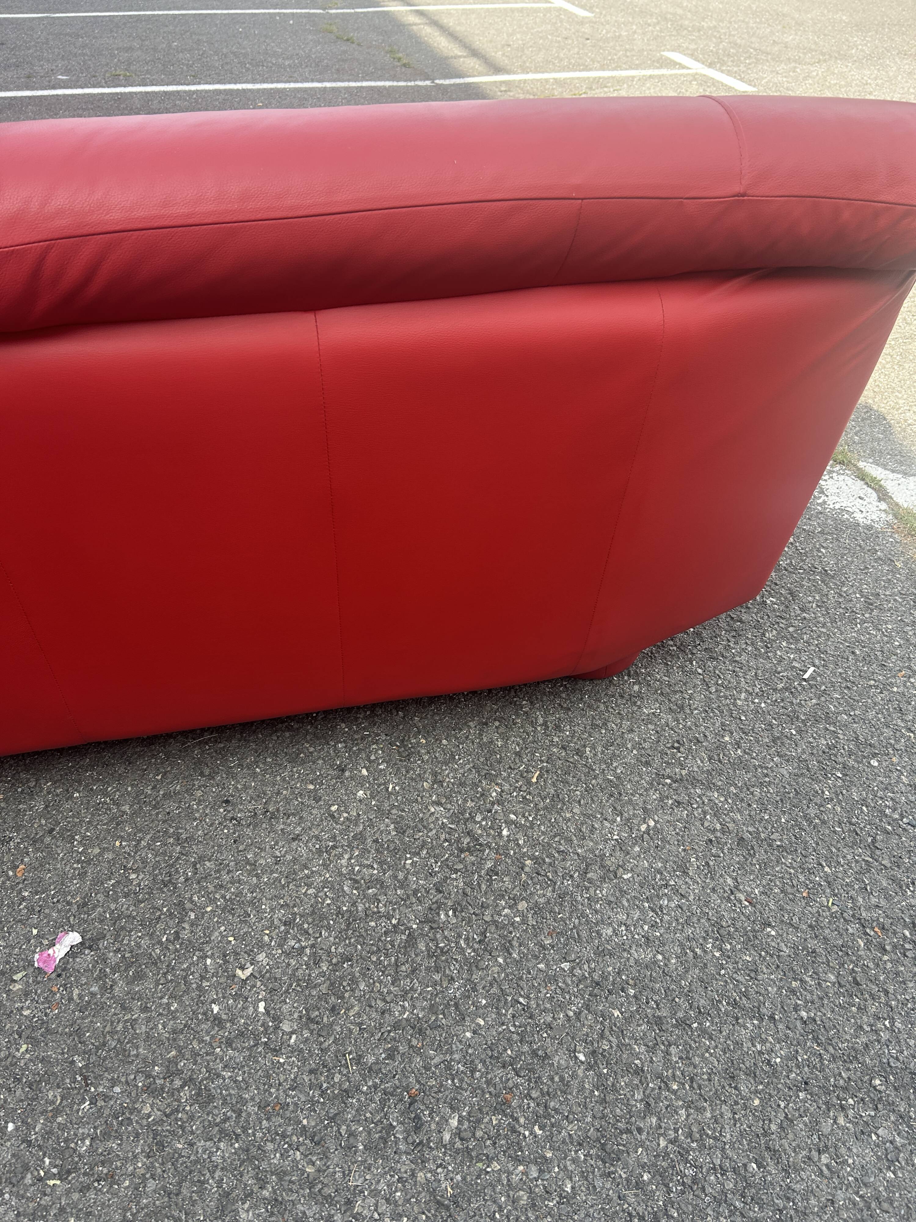 Three-seater red full-grain leather sofa – Vintage Italian design from the years.