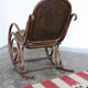 Chaise berçante de bois plié de cru