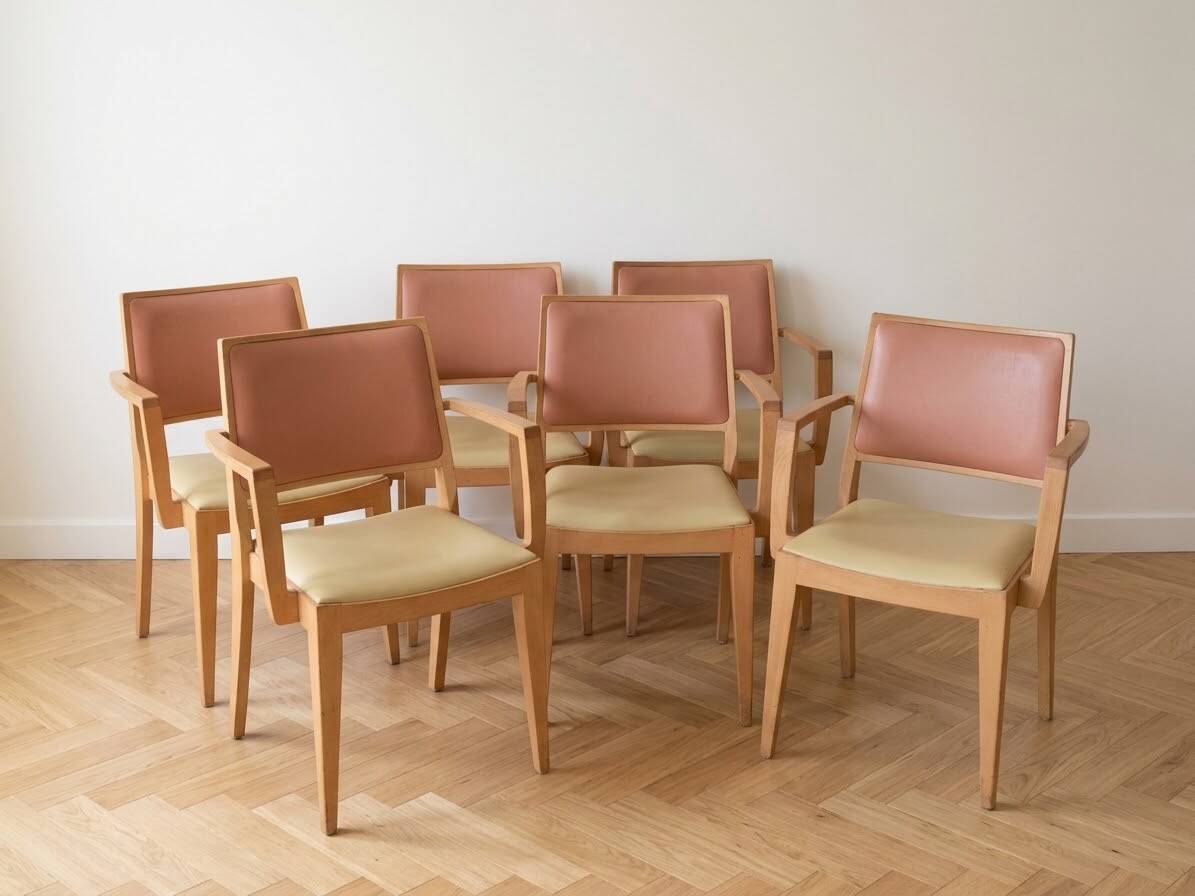 Set of 6 vintage Scandinavian chairs in wood and faux leather.