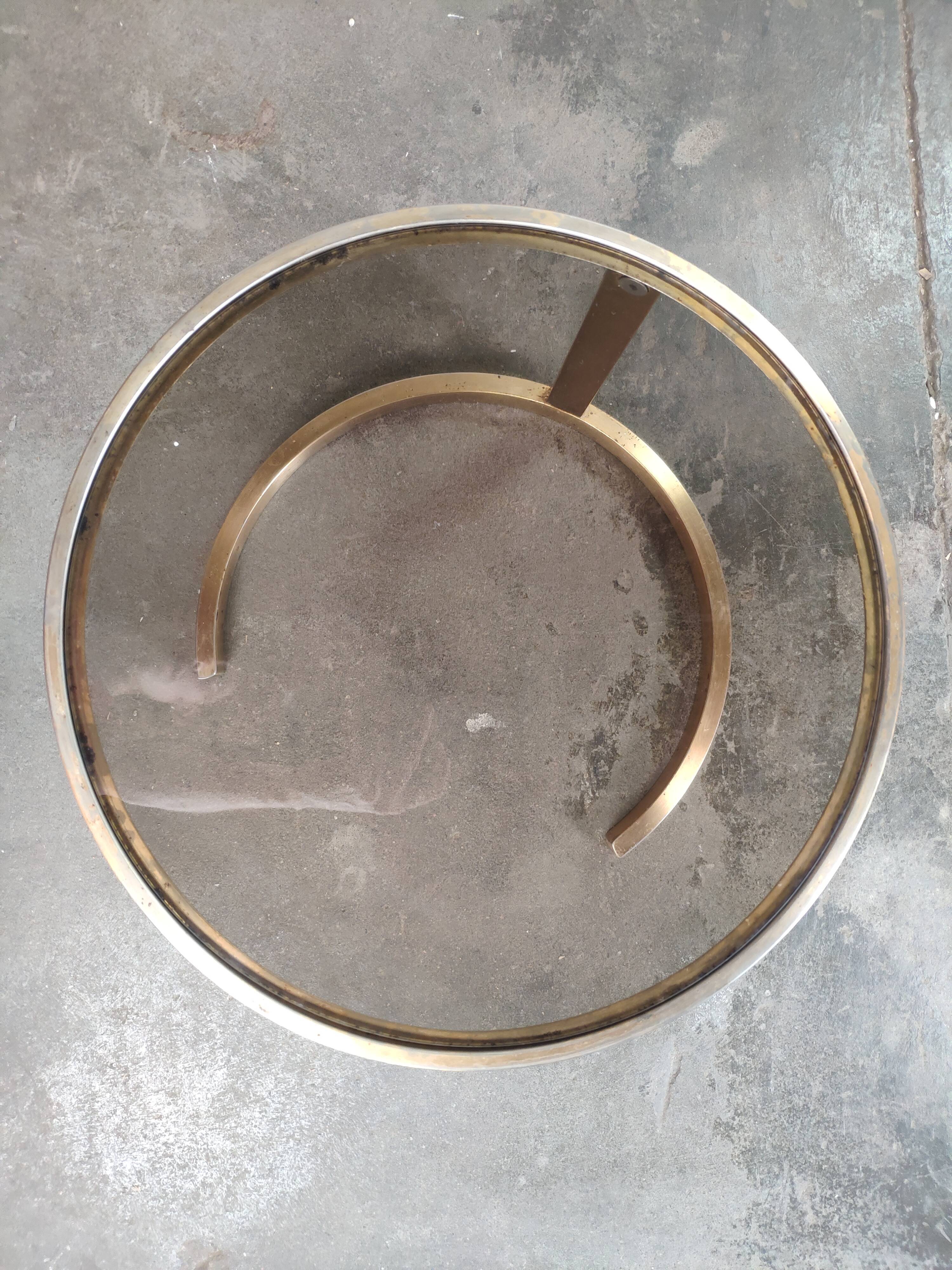 Superb trundle table round golden and smoked glass