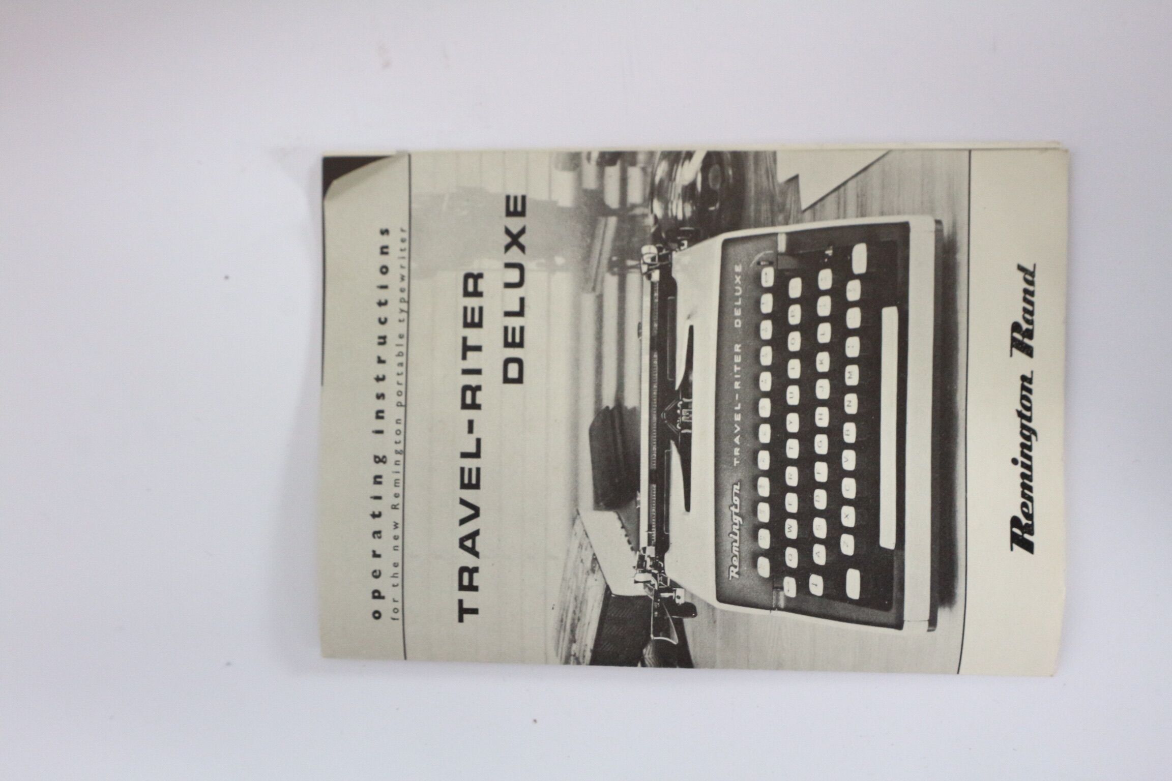 Remington travel-deter Deluxe typewriter with  case