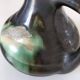 Ceramic pitcher Thulin Belgium flamed green black enamel