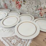 Set of 7 Limoges porcelain dinner plates by A. Vignaud