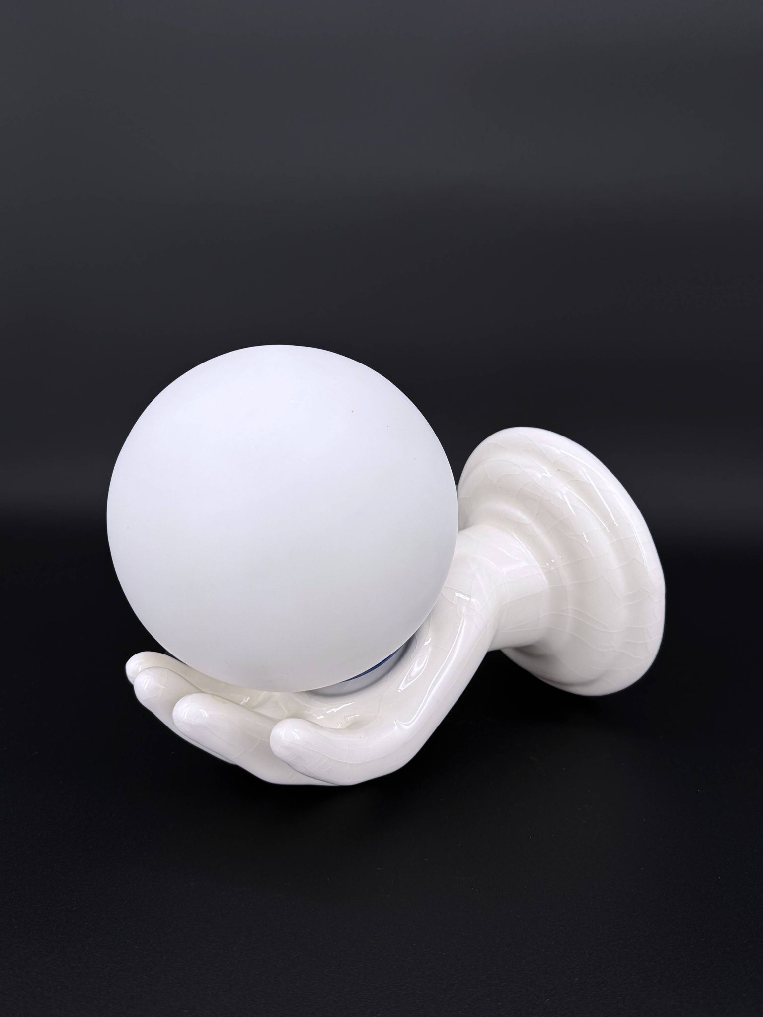 Vintage ceramic wall light - hand holding an opaline globe, 1970s