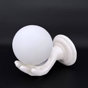 Vintage ceramic wall light - hand holding an opaline globe, 1970s