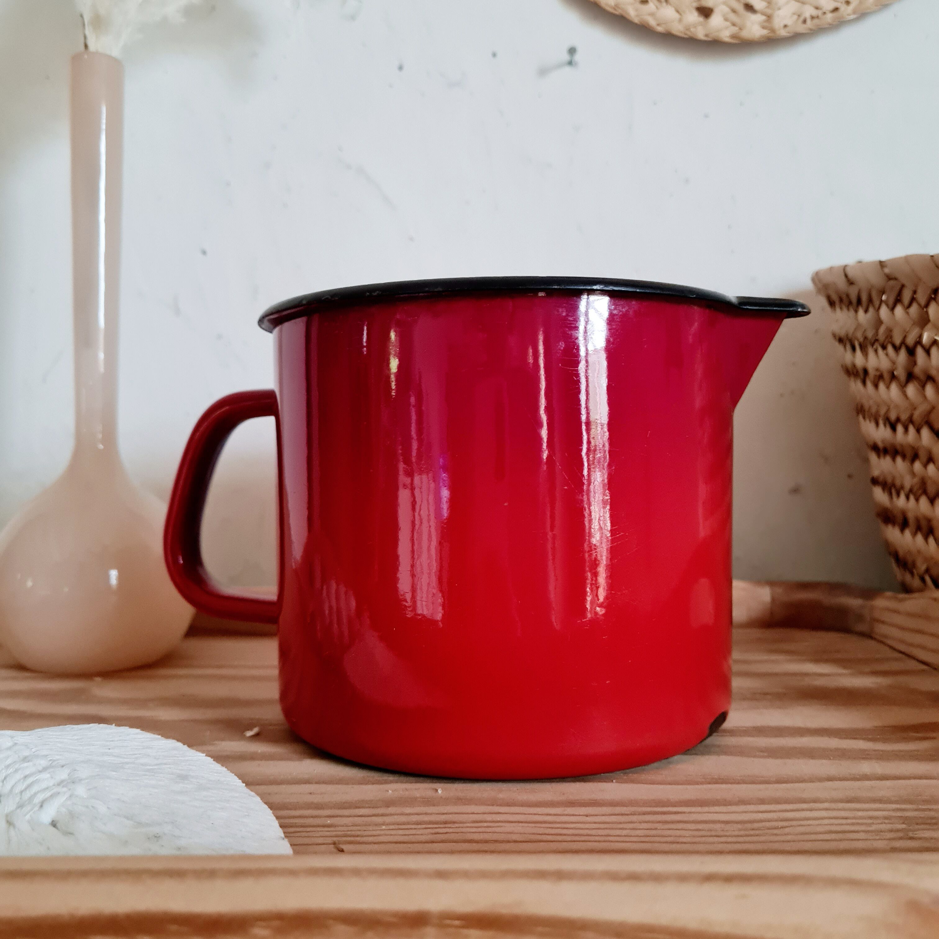 Pitcher vase in red enamelled sheet metal