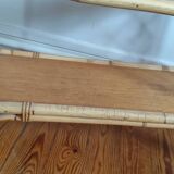 Blond rattan shelf