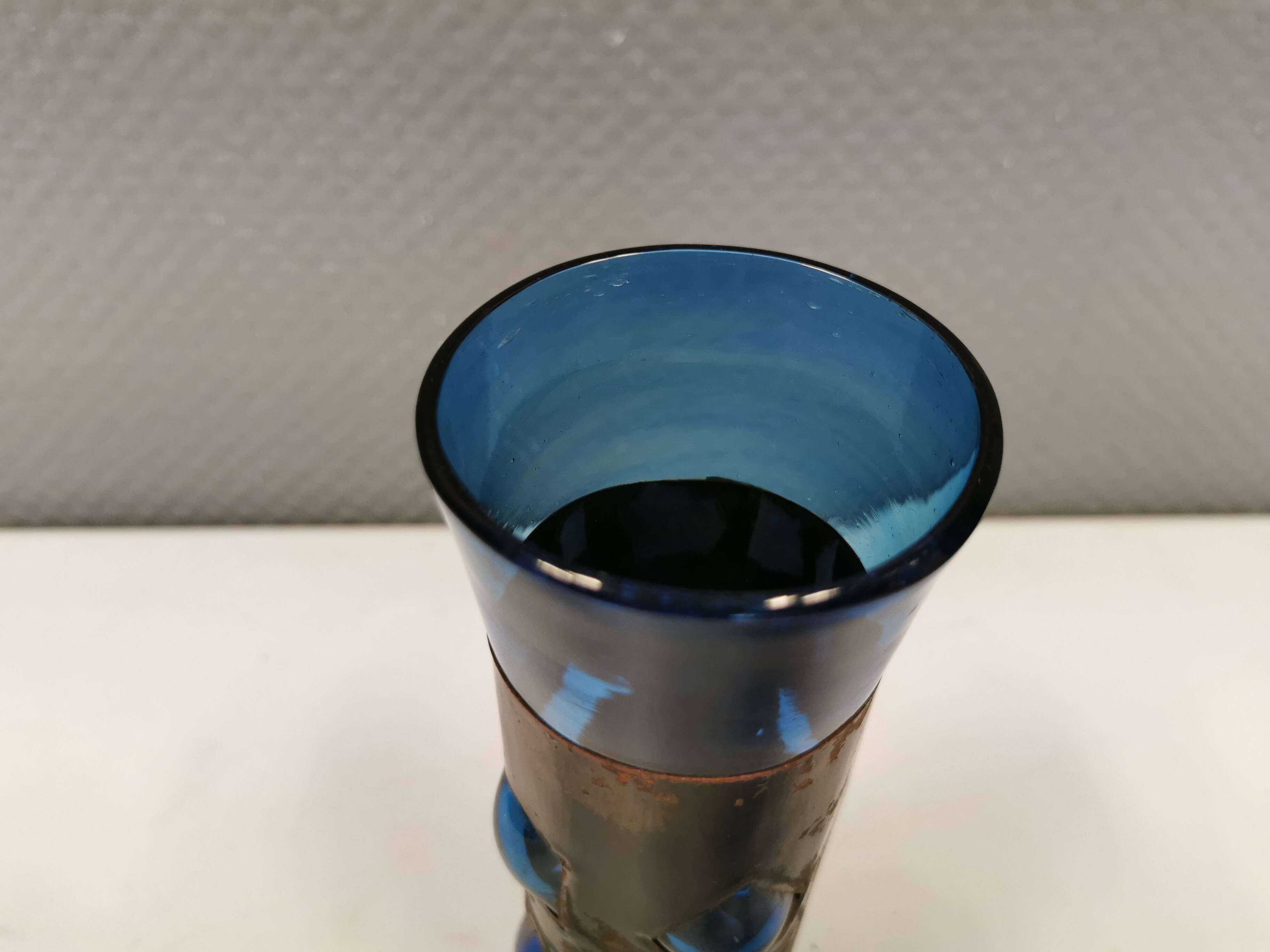 Brutalist style vase with inner blue glass mouth-blown out through the metal "frame".