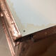 Old chest of drawers restored golden copper color