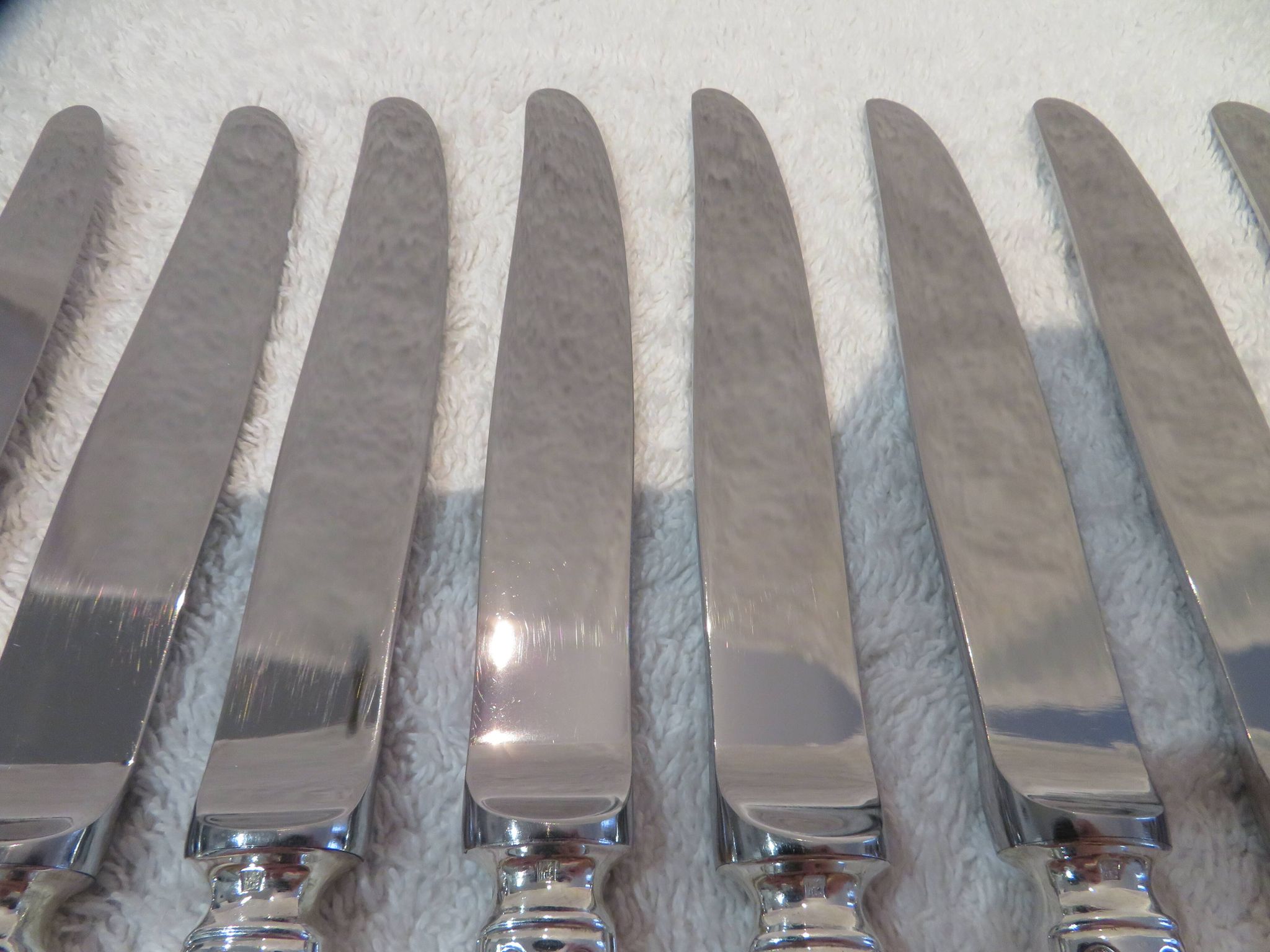 12 Christofle Chinon silver plated dessert knives, 19.7cm