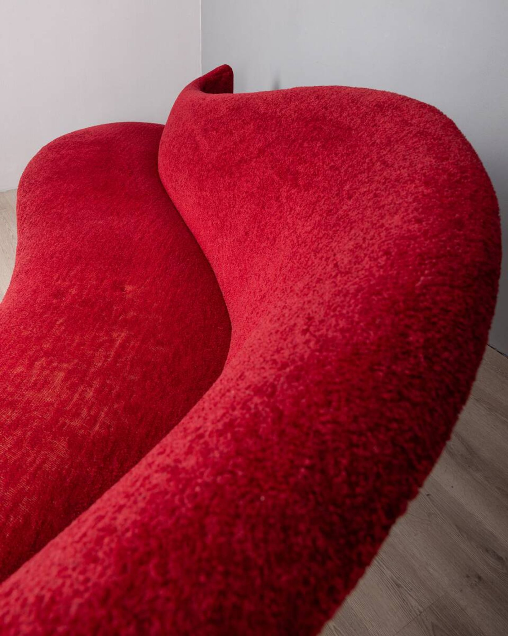 Large 1950s vintage curved sofa in red velvet italian design