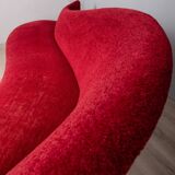 Large 1950s vintage curved sofa in red velvet italian design