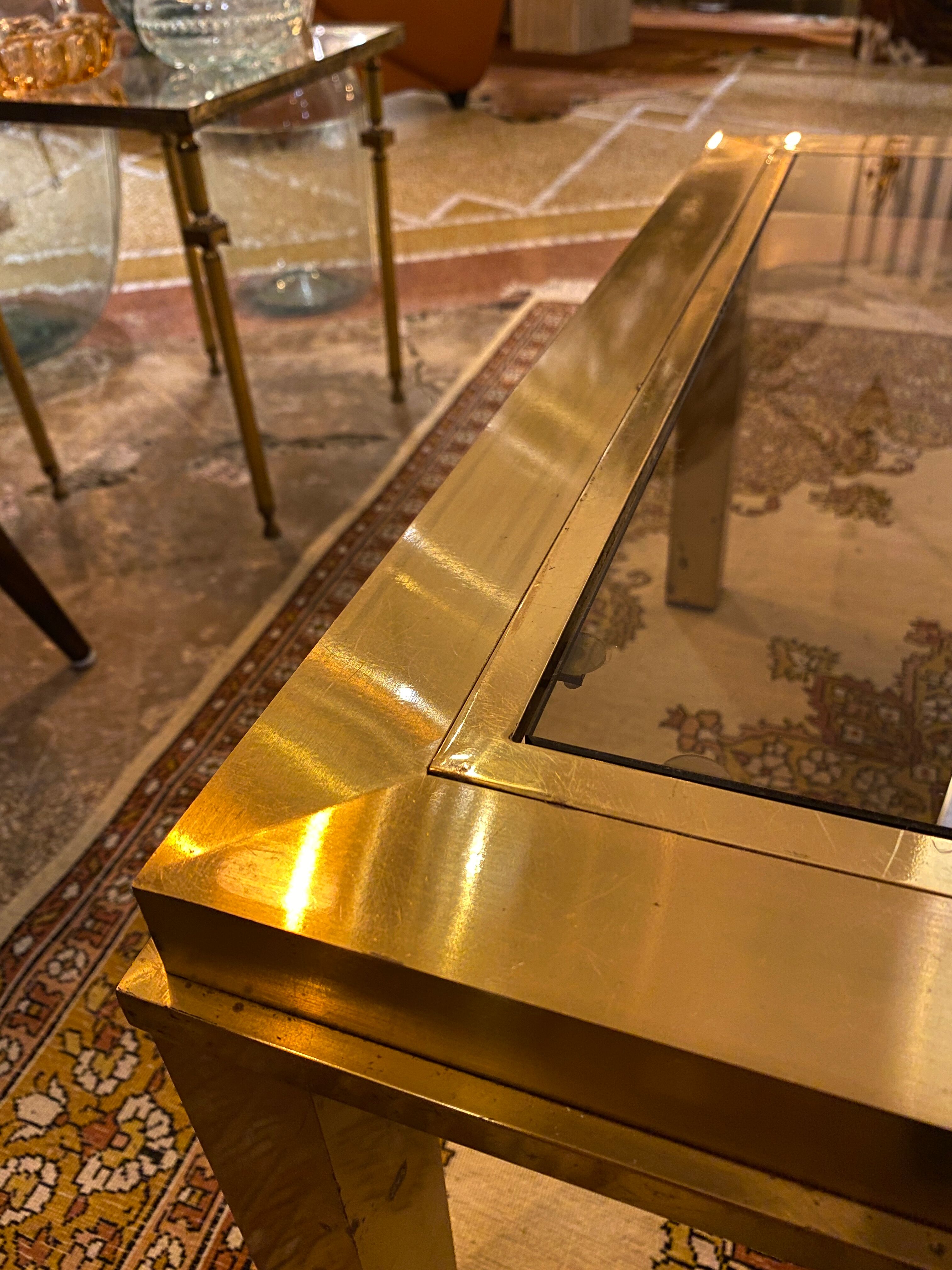 Gold square coffee table and smoked glass