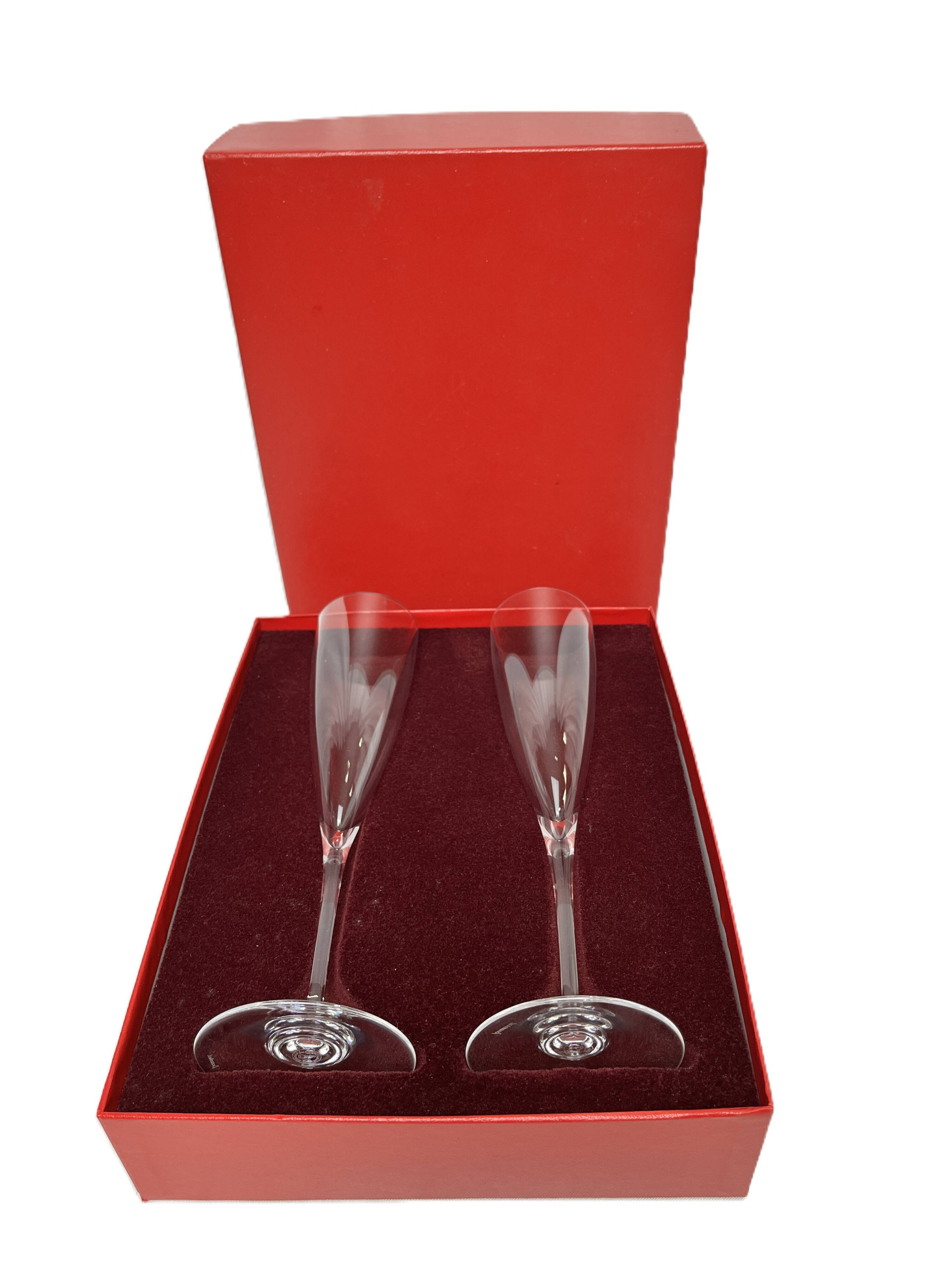 Baccarat, two Dom Pérignon crystal champagne flutes