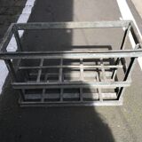 Old bottles in rectangular zinc locker