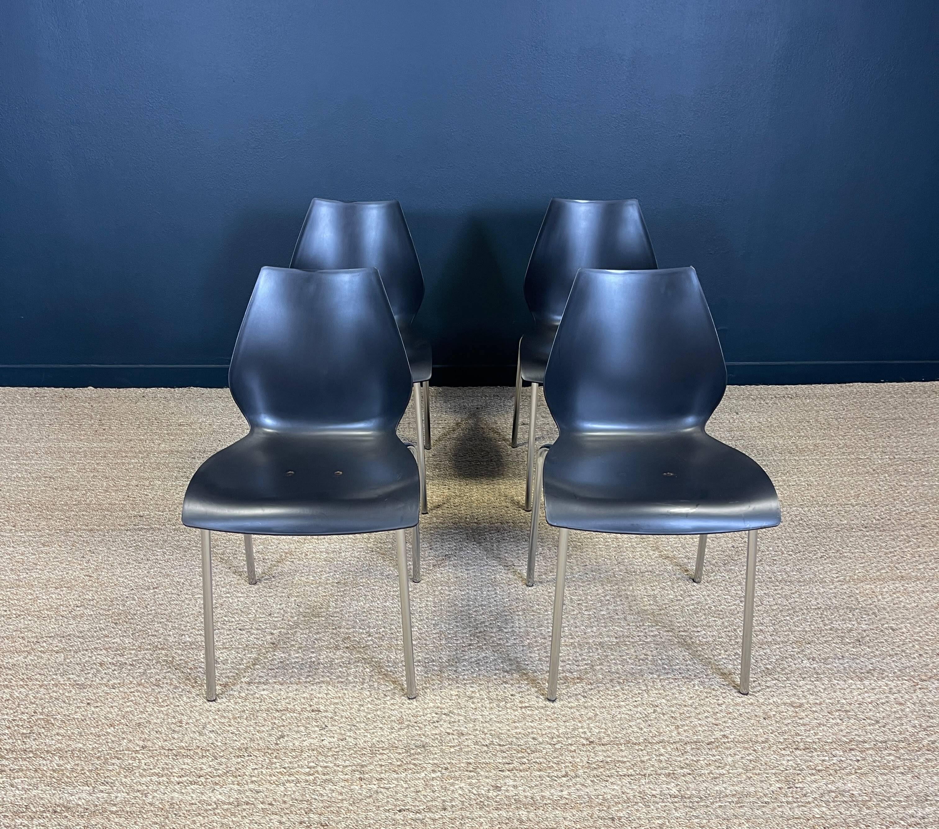 Set of 4 black dining room chairs from the 2000s