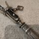 Silver metal handle in the style of Louis XVI.