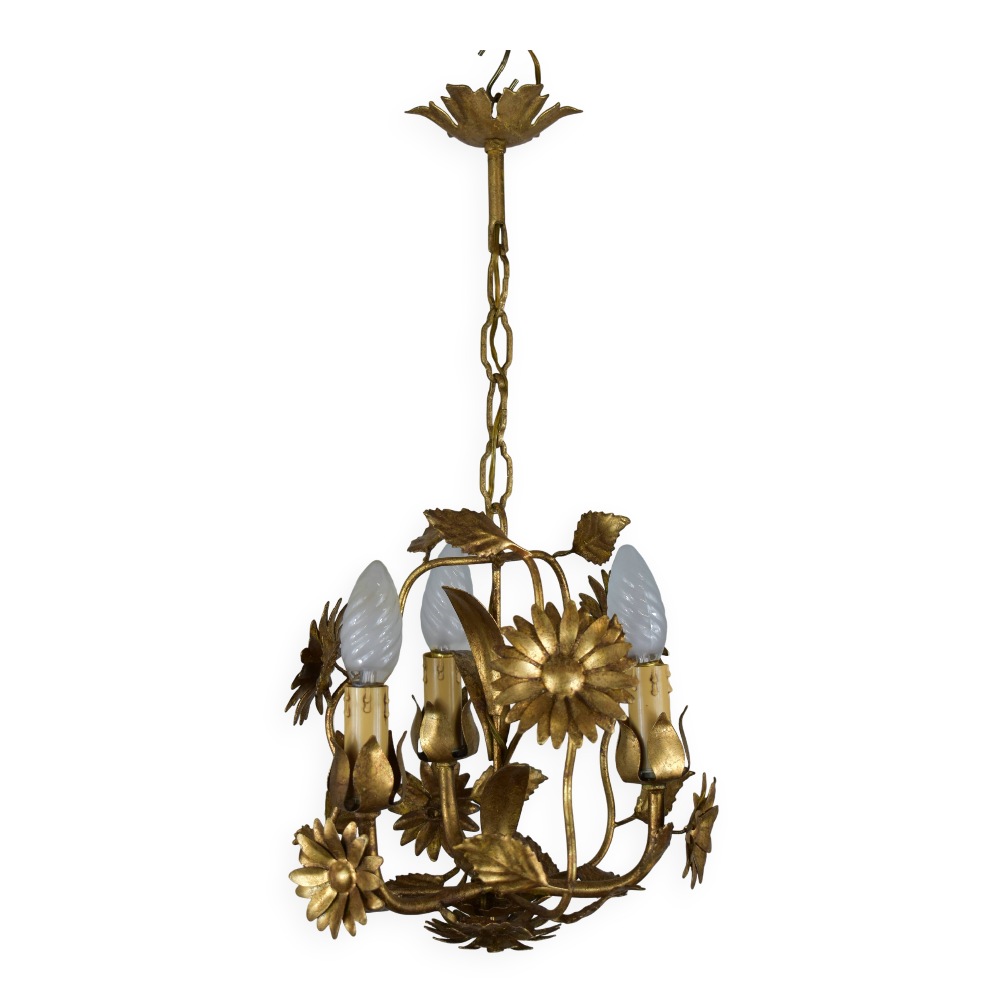 golden chandeliers with flowers.
