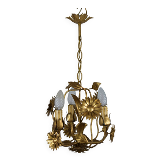 golden chandeliers with flowers.