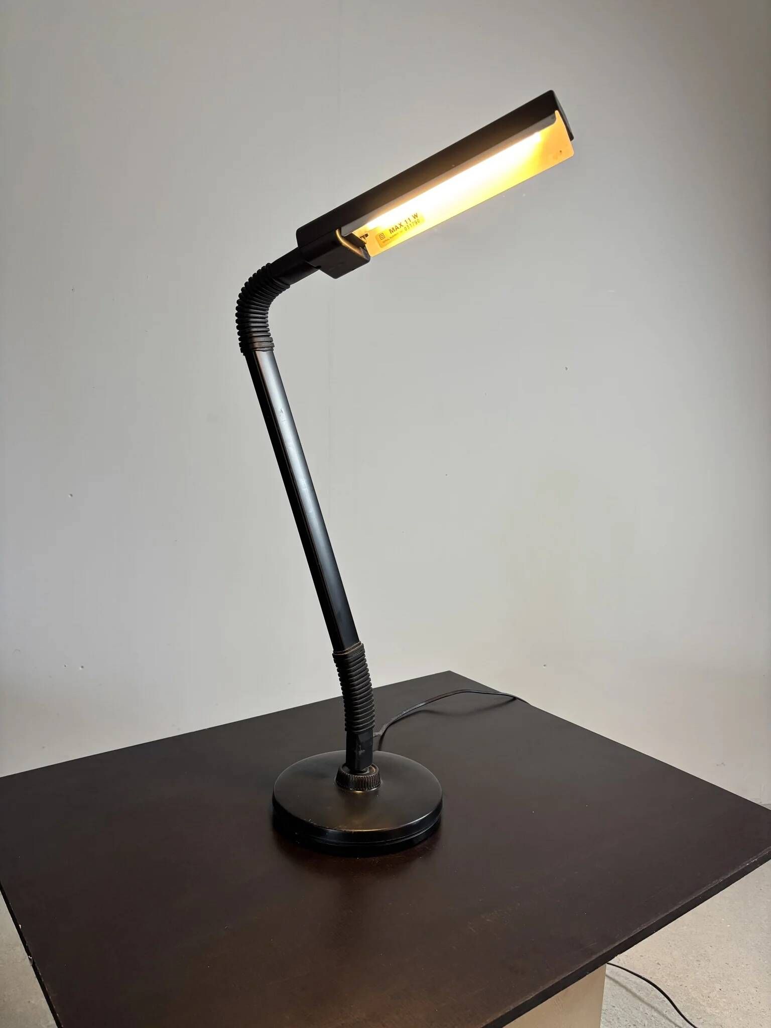 Pair of black articulated desk lamps — Ledu