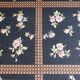 Black tablecloth with bouquets of roses