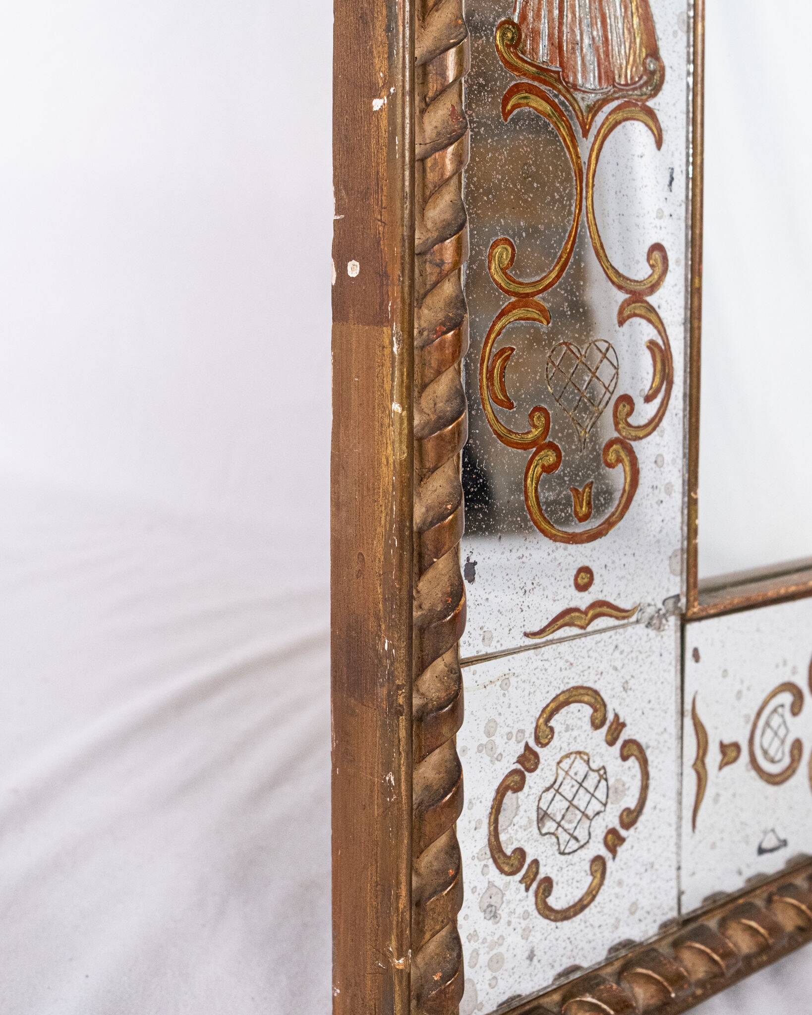 Miroir italien en verre églomisé, à parecloses, début XXe siècle