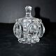 Thick moulded crystal sugar bowl with a beaded and medallion design.