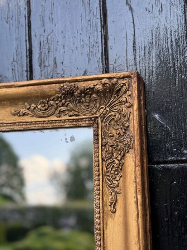 Miroir Empire en bois stuqué et doré, début XIXème siècle