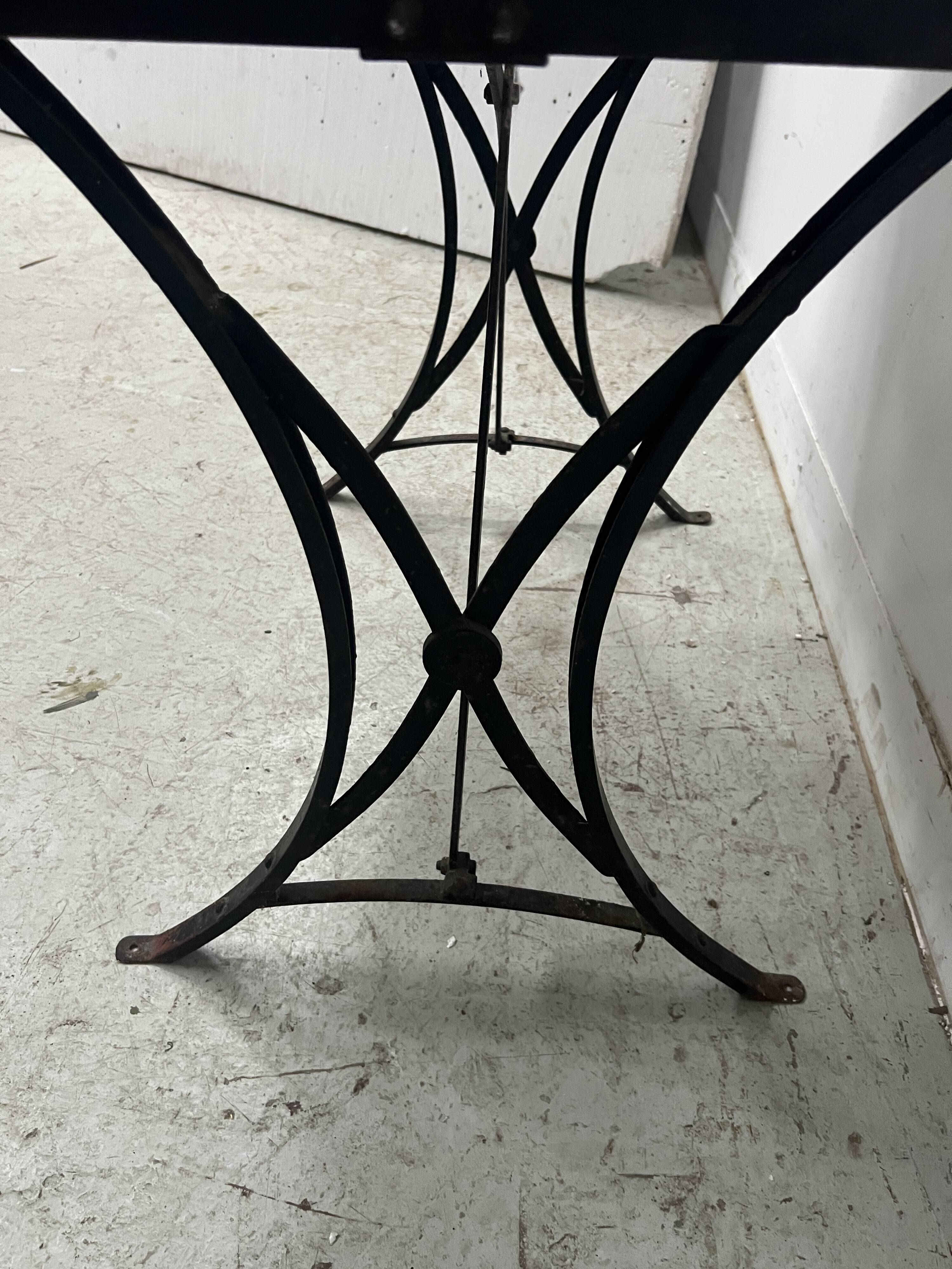 Garden table or veranda in cast iron from the 20th century.
