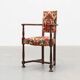 Antique oak Louis XIII style chair with floral upholstery, France ca. 1890