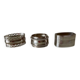 Trio of silver metal napkin rings