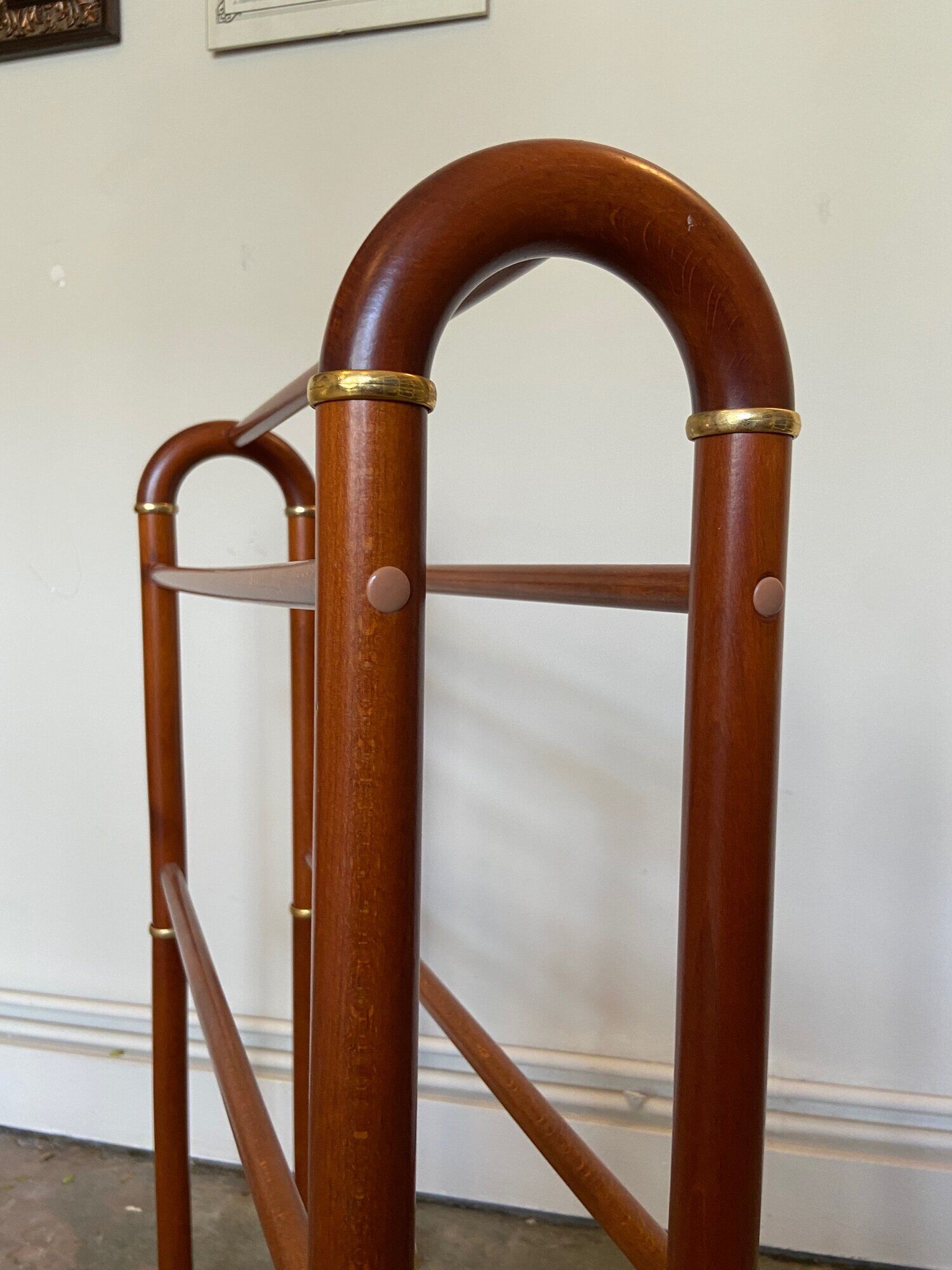 Dark wood towel rail