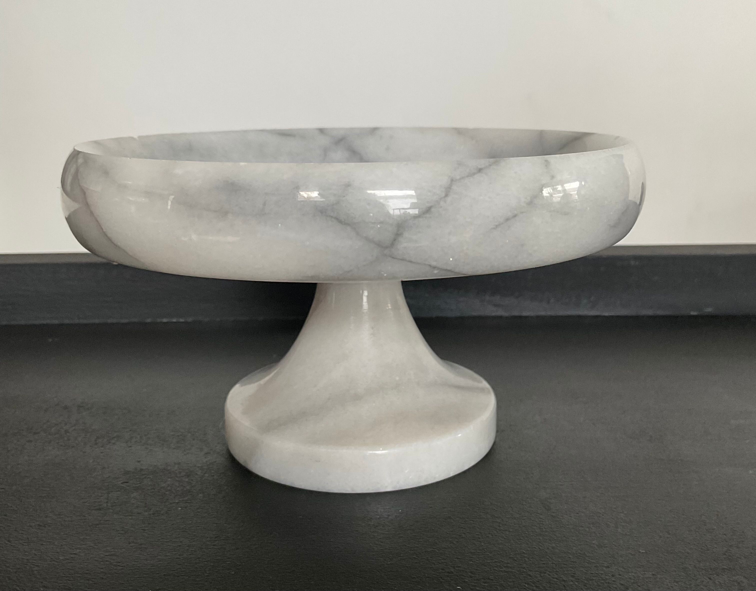 Empty pocket on vintage stand in white marble 70s