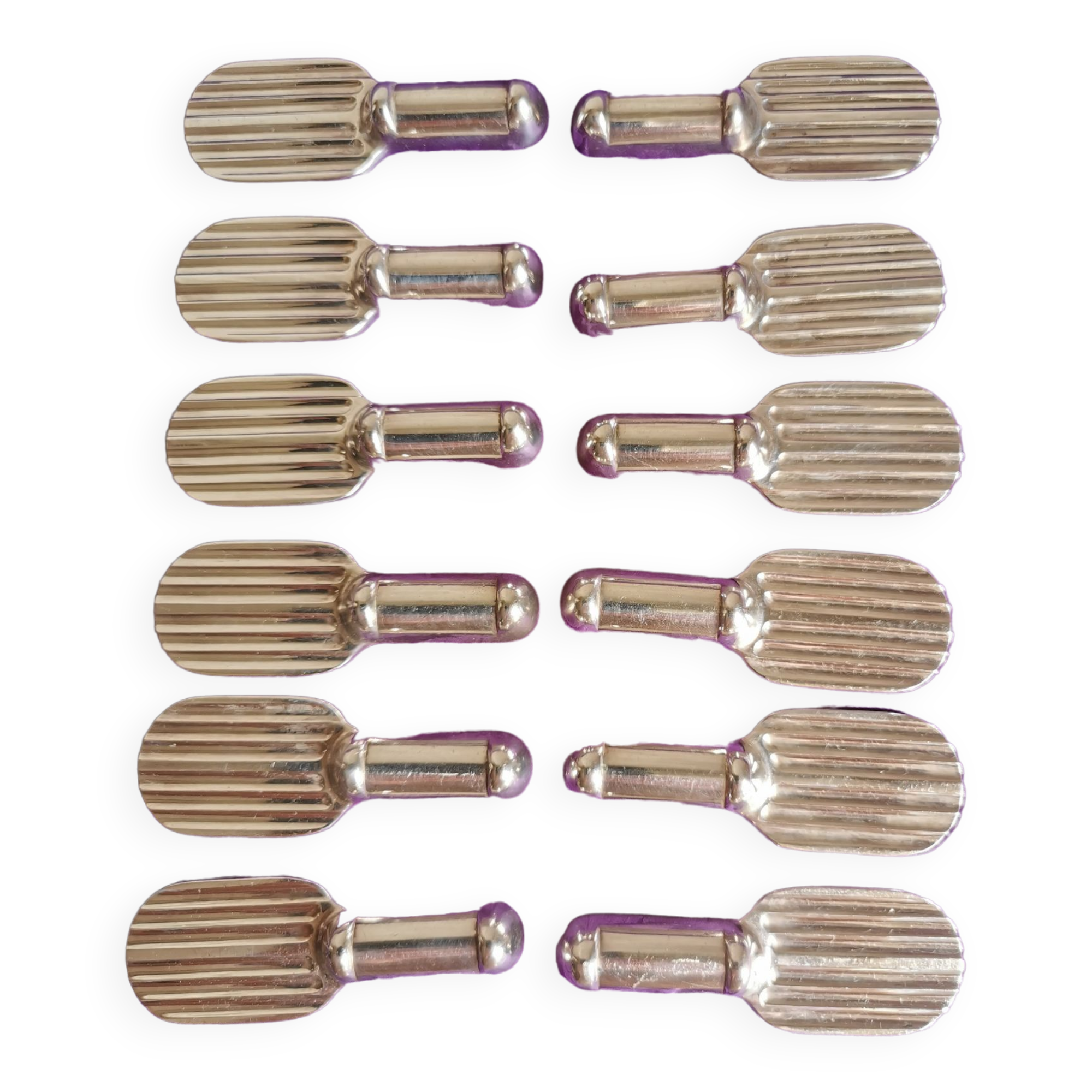Twelve Christofle knife holders in silver metal