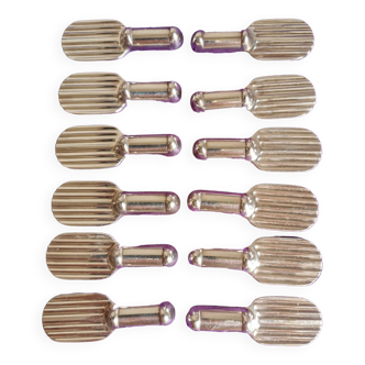 Twelve Christofle knife holders in silver metal