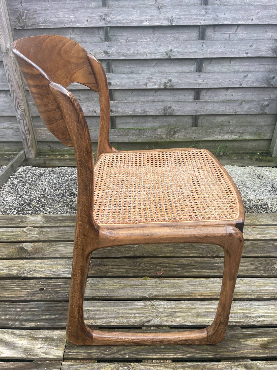 4 magnificent Baumann sled chairs, with caning.