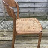 4 magnificent Baumann sled chairs, with caning.