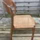 4 magnificent Baumann sled chairs, with caning.