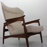 Danish adjustable wingback lounge chair in teak by Ib Kofod Larsen