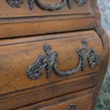 Curved Louis XV style chest of drawers known as a “tomb”