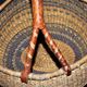 Vintage round basket in woven straw and leather - ethnic decorative ball basket