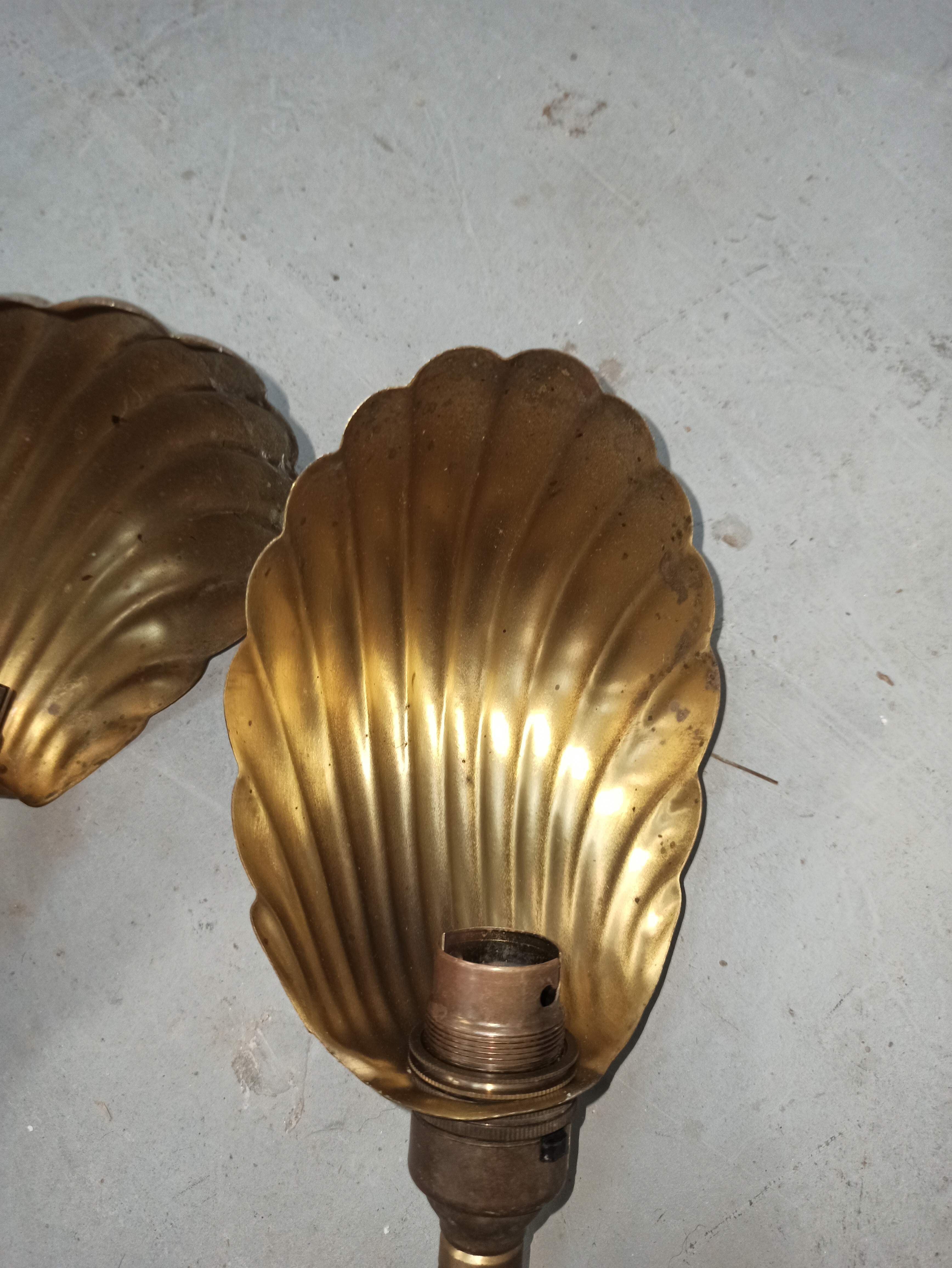 Trio of wall lamps Christopher Wray applies articulated lamp shell