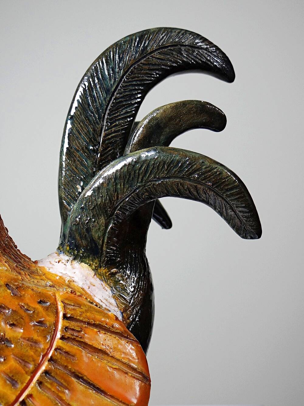 Small decorative rooster in handcrafted enameled ceramic folk art