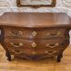 Curved commode in Louis XV / Regency style in solid oak.