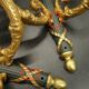 Pair of large wall sconces in quiver style Empire - bronze / green patina