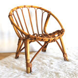 Child chair in rattan shell shape