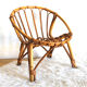 Child chair in rattan shell shape
