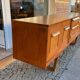 Atypical teak row of the 60s