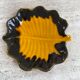 Yellow and black leaf dish